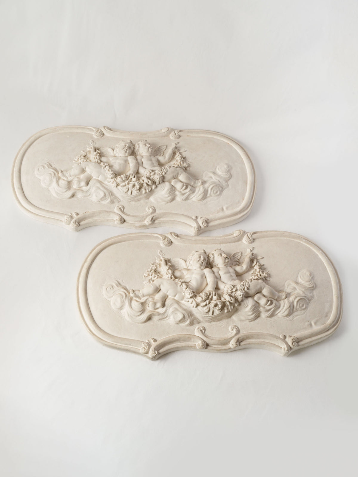 Pair of French Plaster Overdoor Panels with Cherubs, circa 1900 - 14½" x 27½"