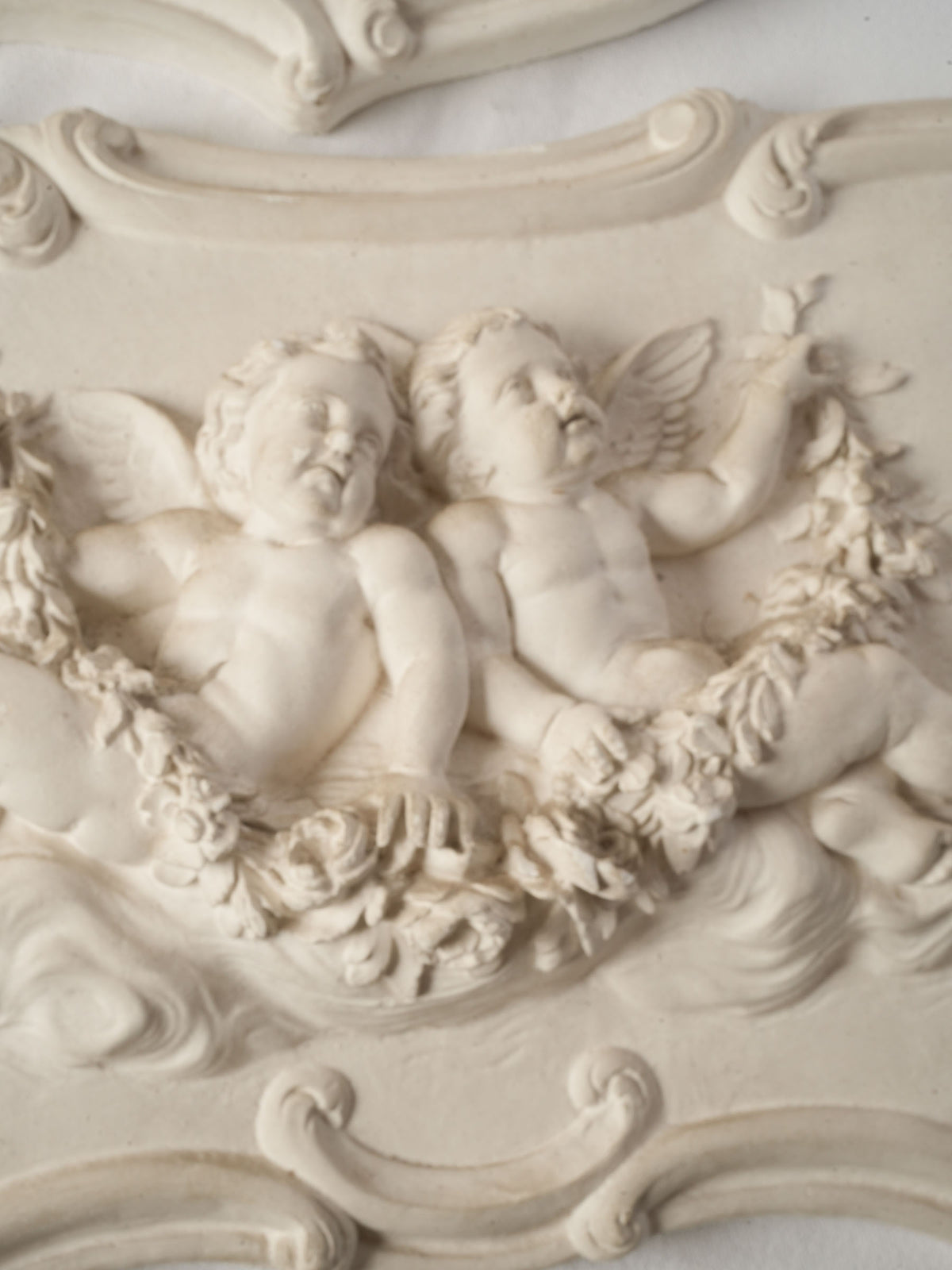 Pair of French Plaster Overdoor Panels with Cherubs, circa 1900 - 14½" x 27½"