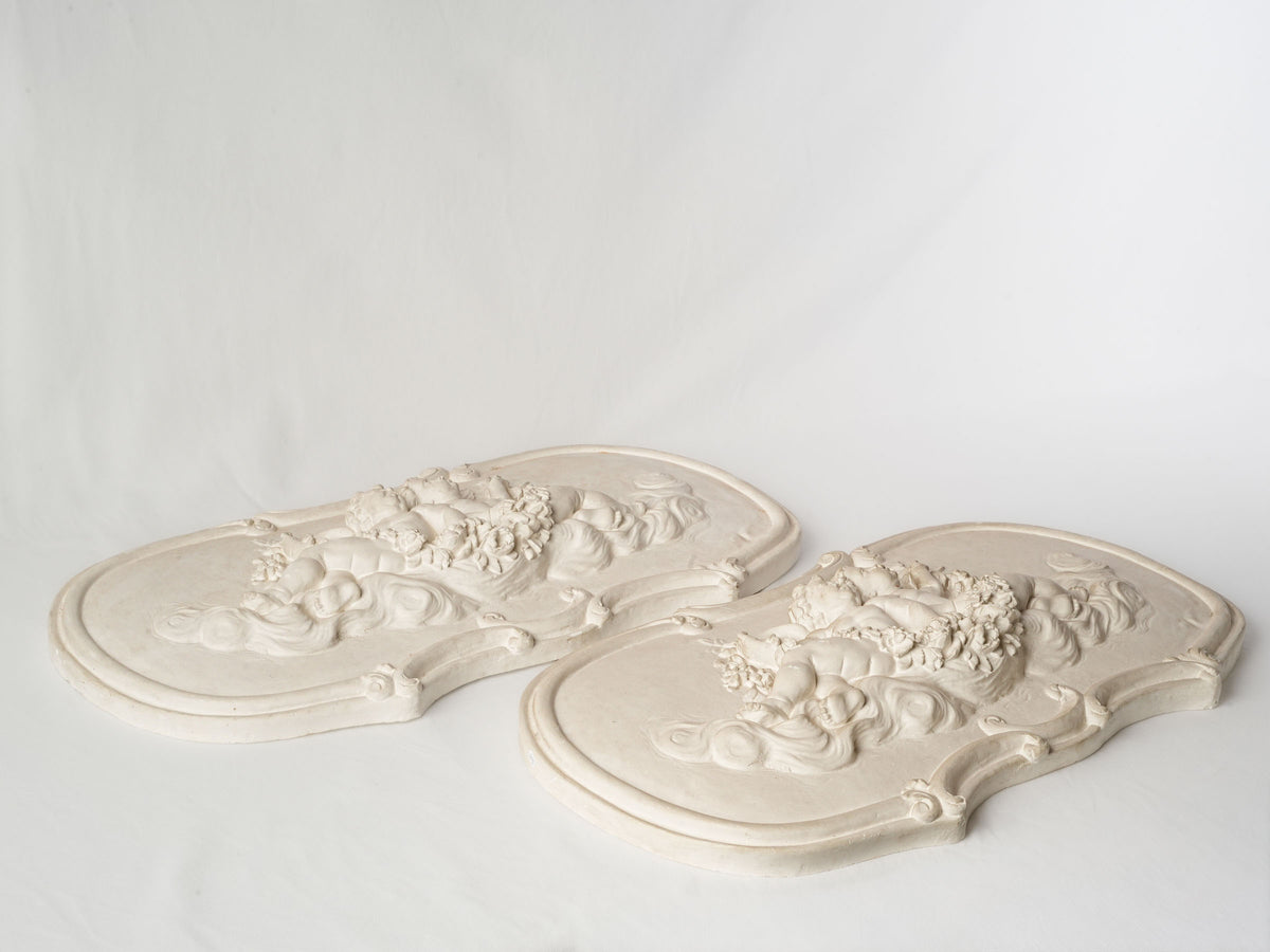 Pair of French Plaster Overdoor Panels with Cherubs, circa 1900 - 14½" x 27½"