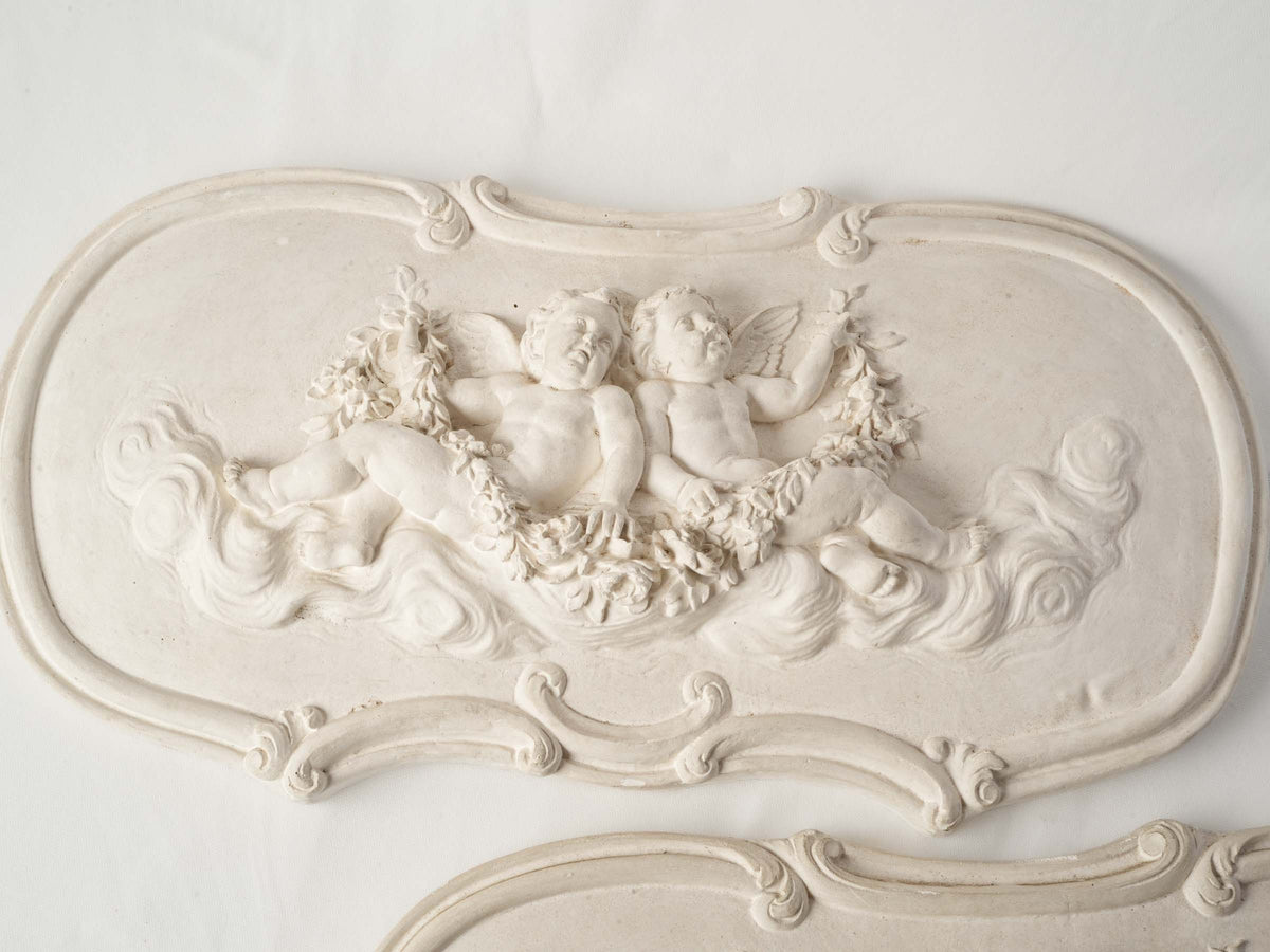 Pair of French Plaster Overdoor Panels with Cherubs, circa 1900 - 14½" x 27½"