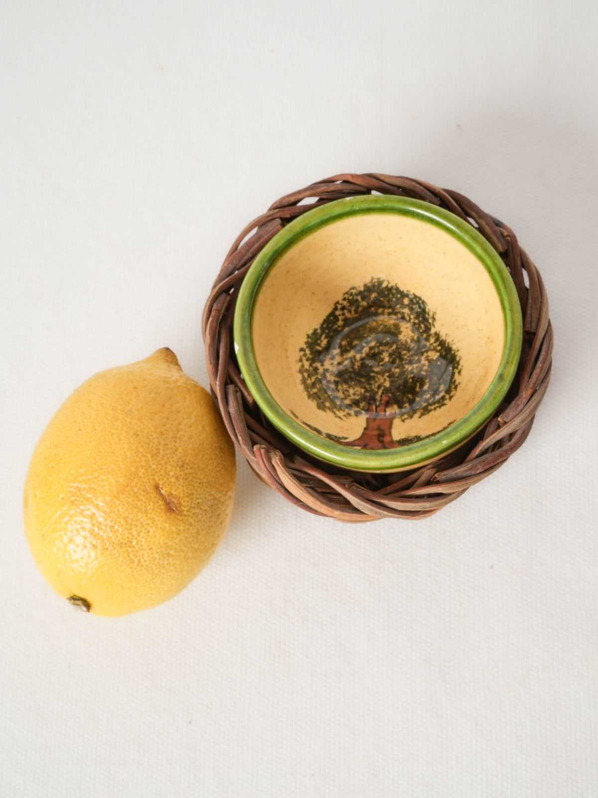 Miniature French Ceramic Bowl with Hand-Painted Tree and Wicker Cradle