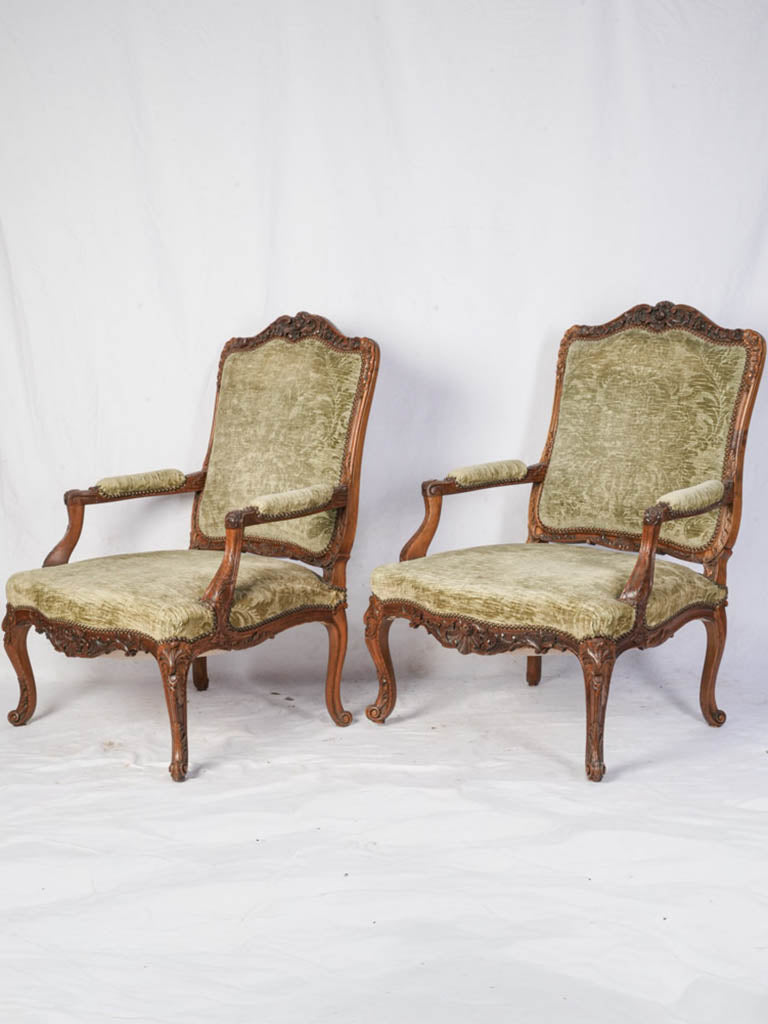 Elegant walnut armchairs, Louis XV–style