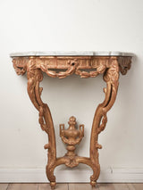 Laurel garlands on marble console table