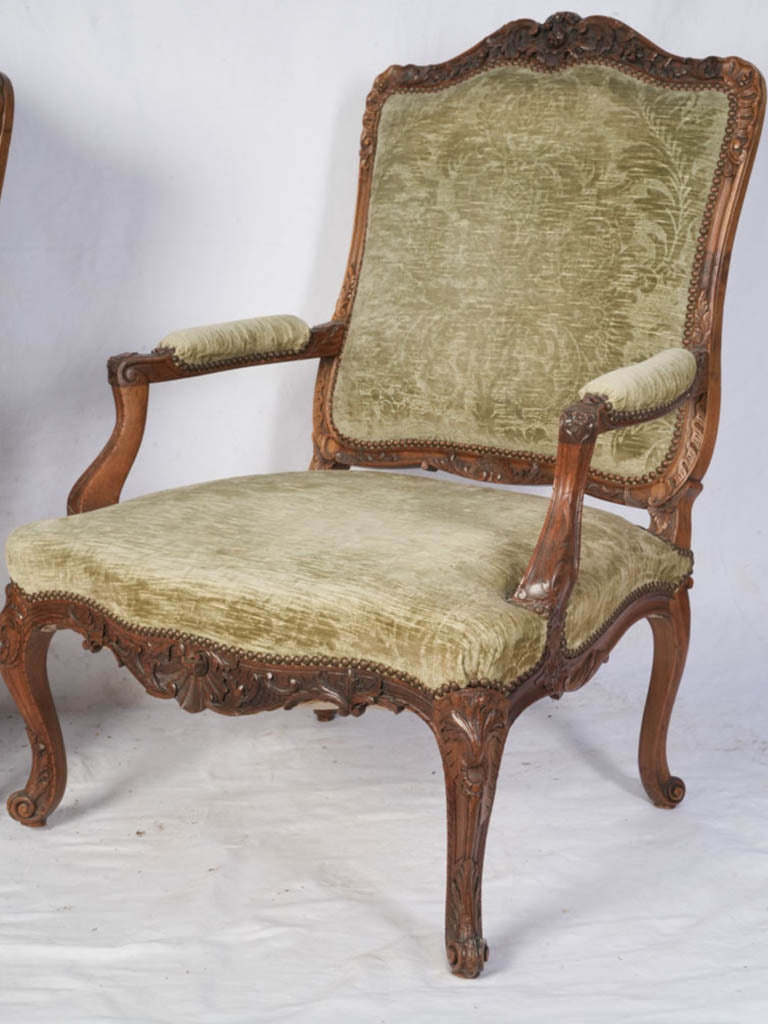 Finely carved walnut armchairs