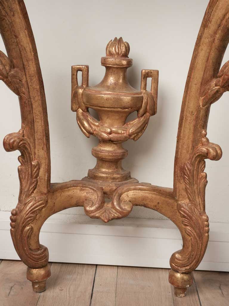 Gilded decorations on 34¼ inch wide table
