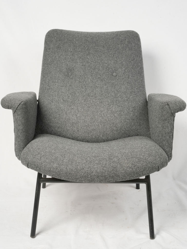 Comfortable reupholstered armchair
