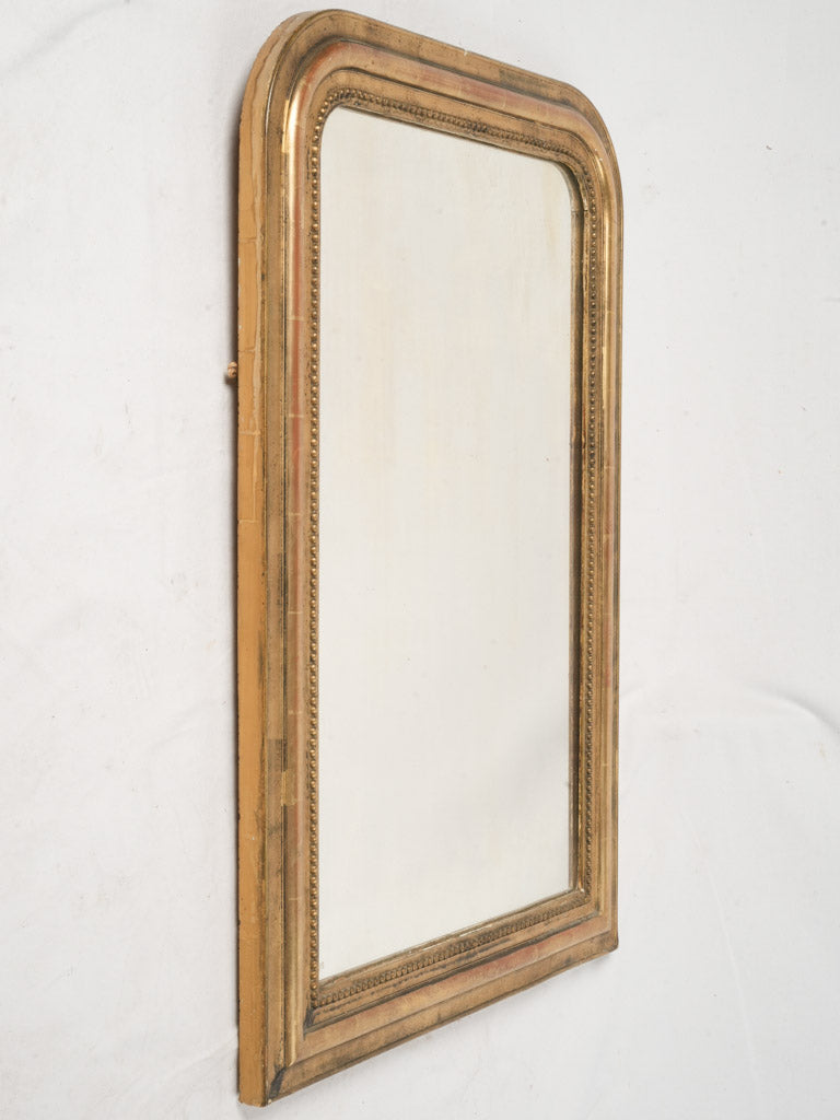 Timeless arched-top vintage mirror  