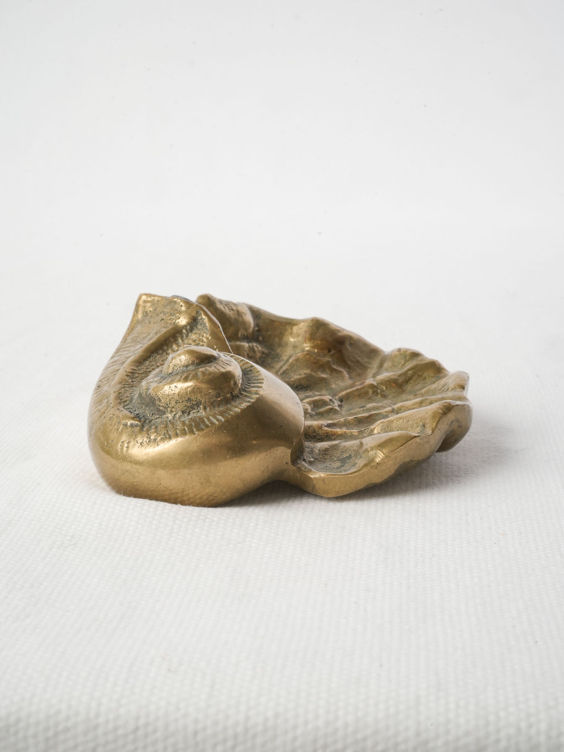 Weighty warm golden patina piece