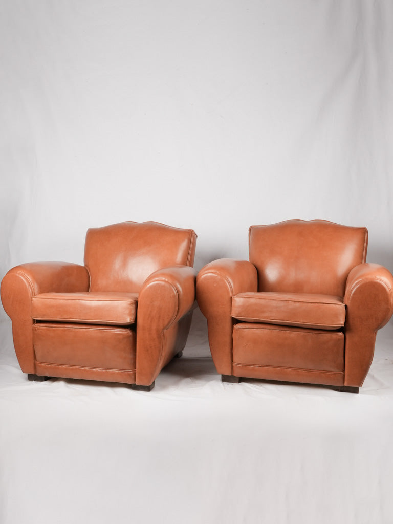 Pair of French leather club chairs - Moustache back