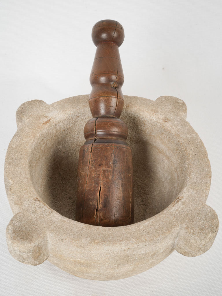 Historic wooden pestle and mortar