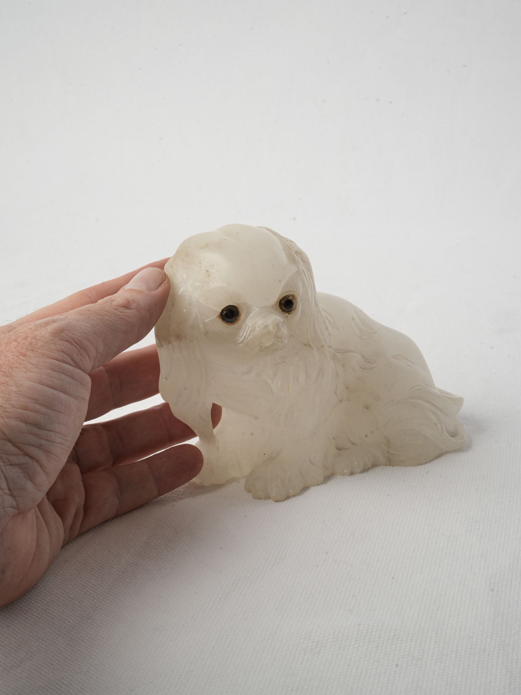 Artistic sulfide eyes dog sculpture