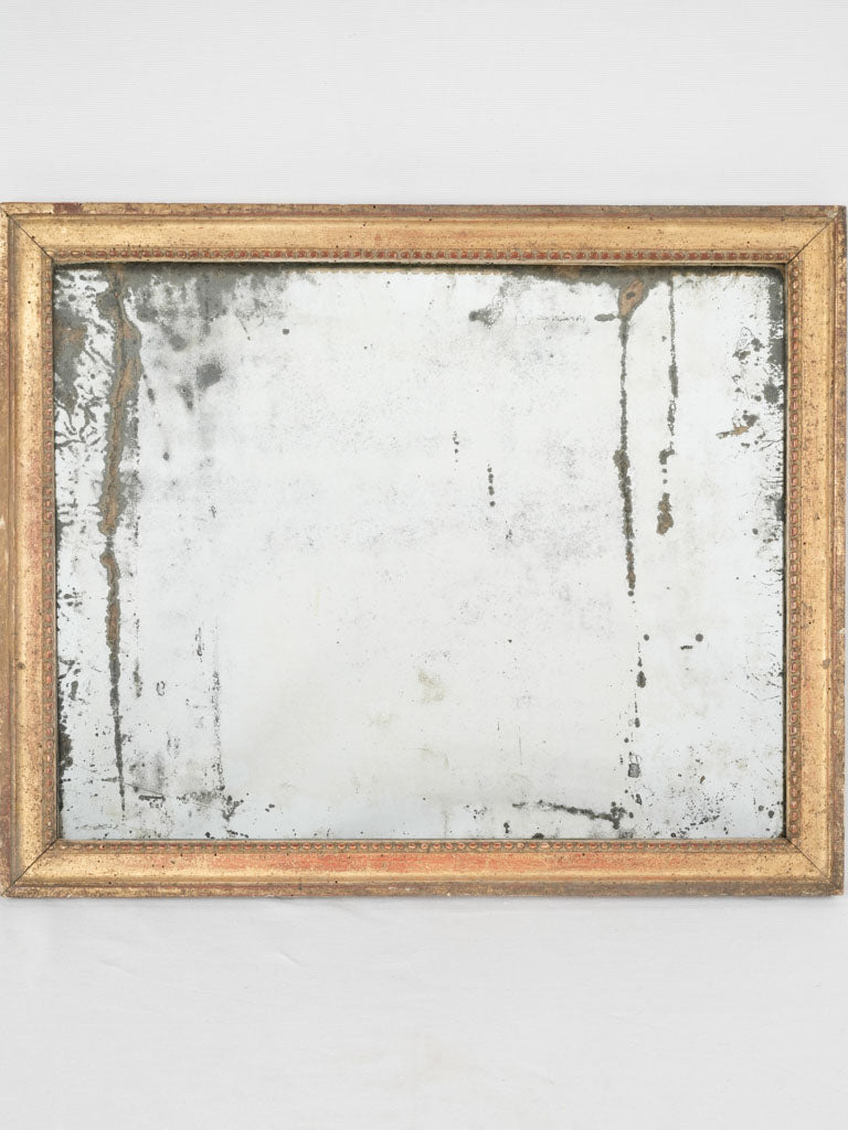Vintage gilded Louis XVI wall mirror