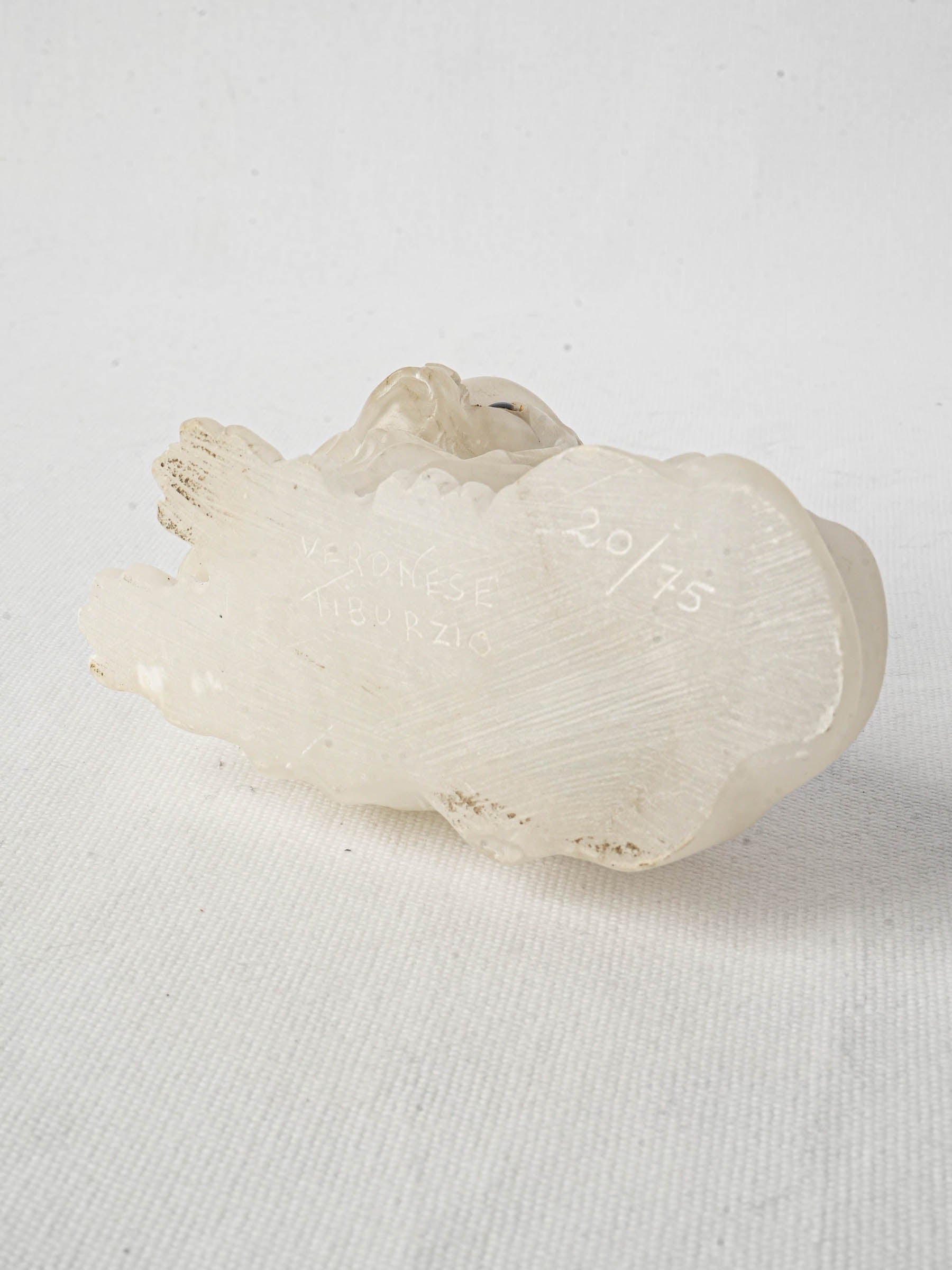 Naturalistic style Pekingese dog carving