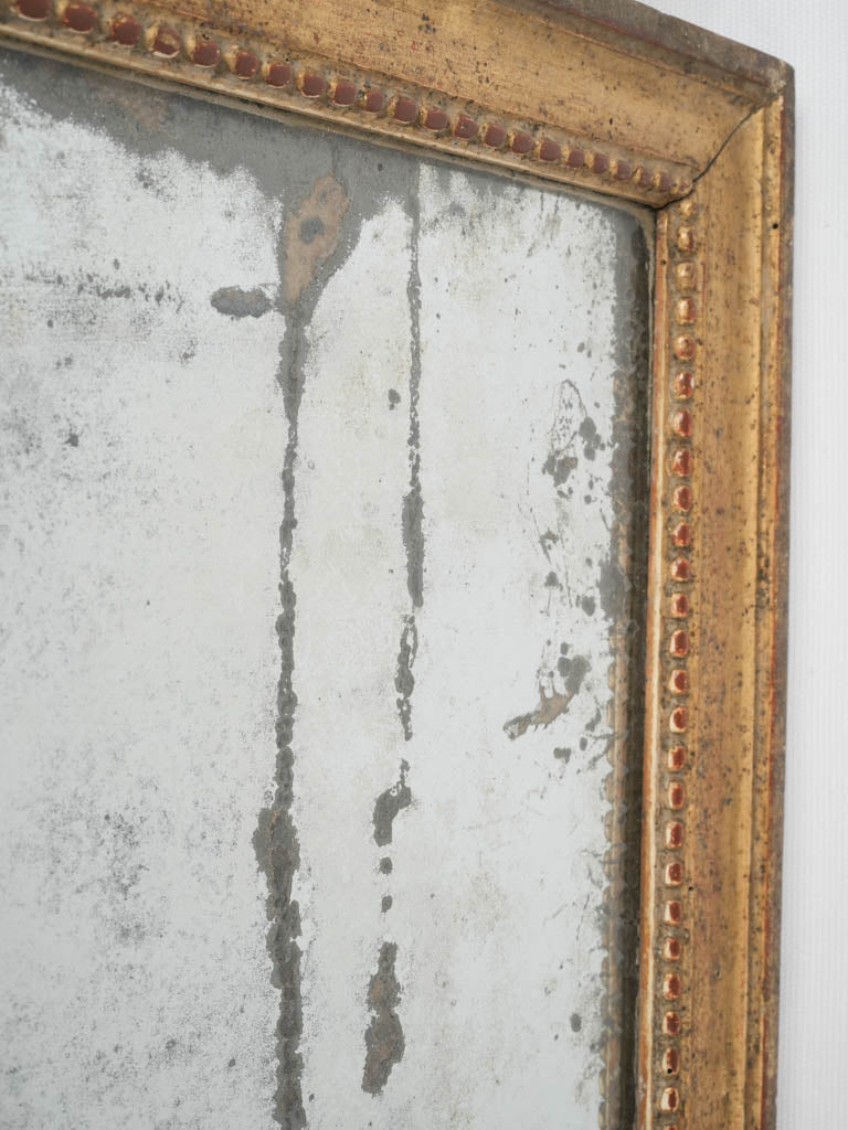 Classic Louis XVI period gilded mirror