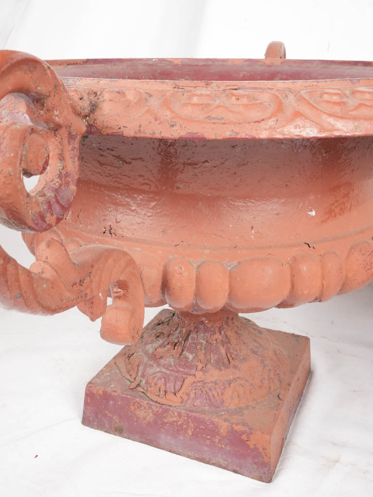 Patinated red garden accent urns