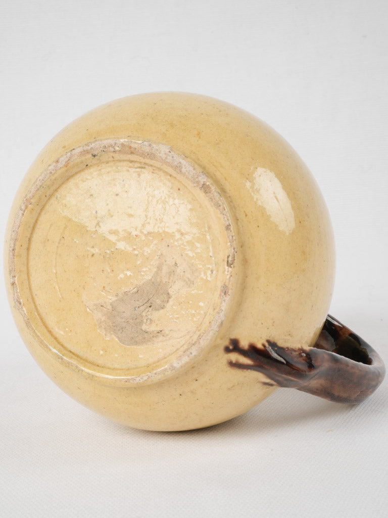 Old-world Dieulefit yellow-glazed pottery jug