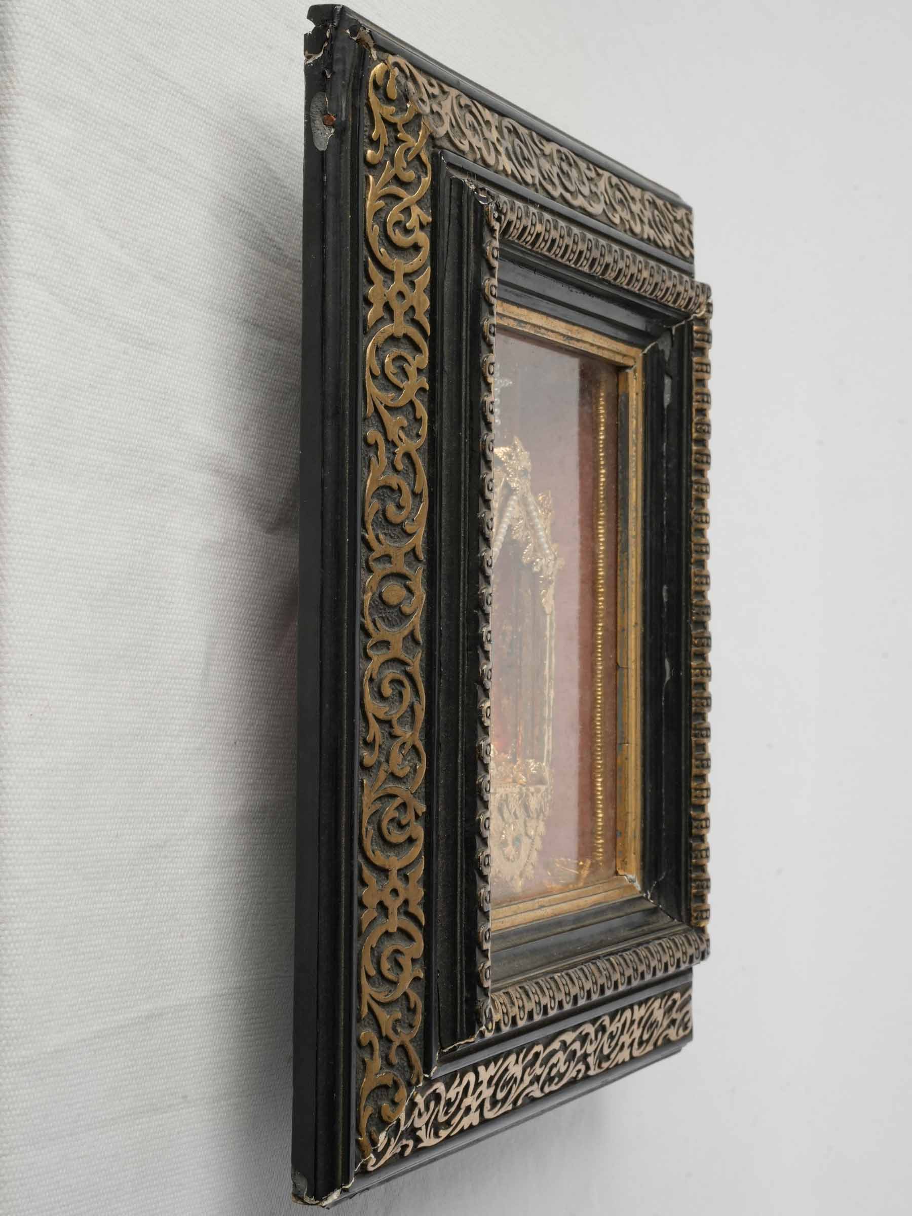 Glass-framed religious collectable artifact  