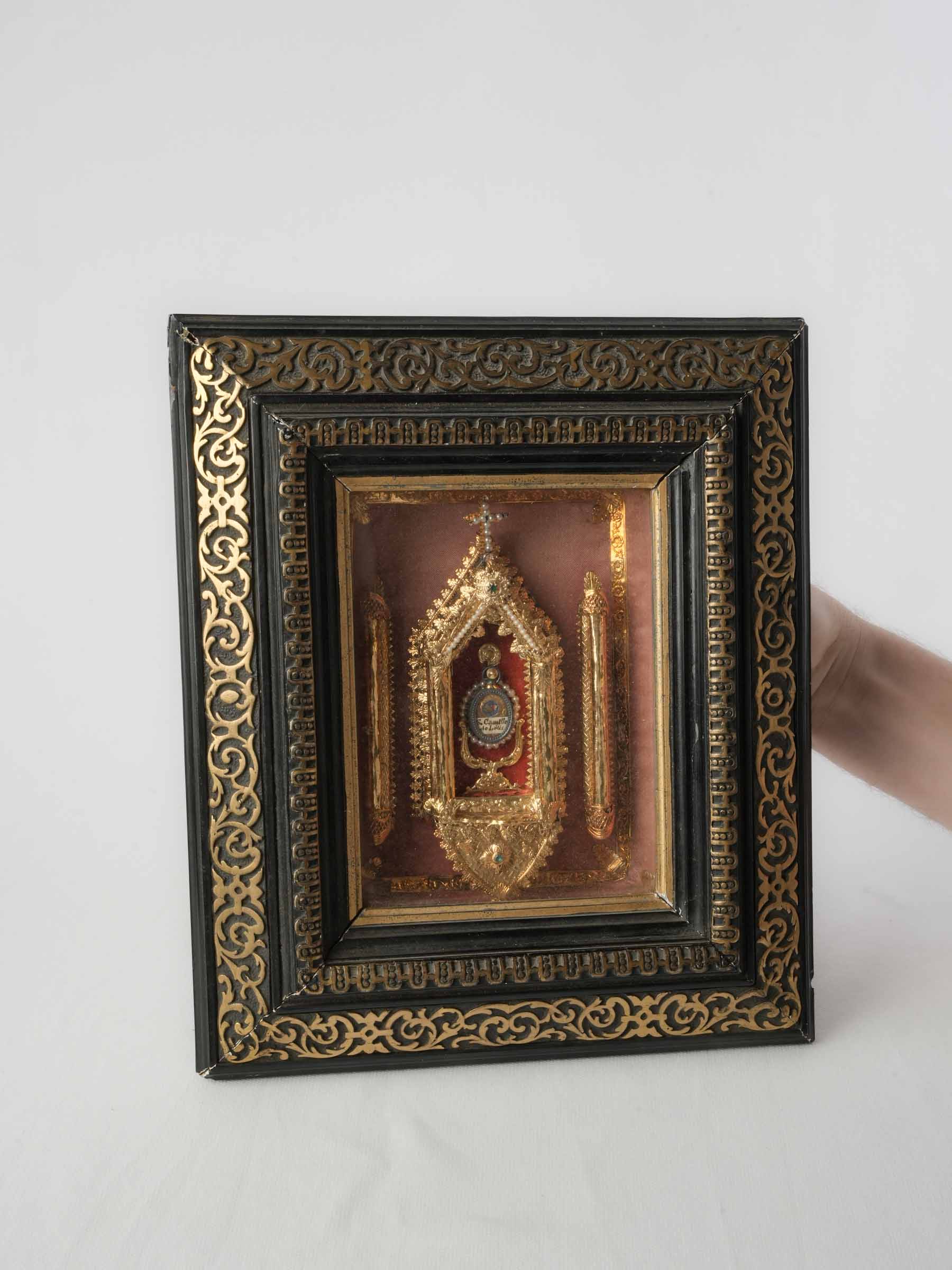Historical 19th-century saintly medallion  