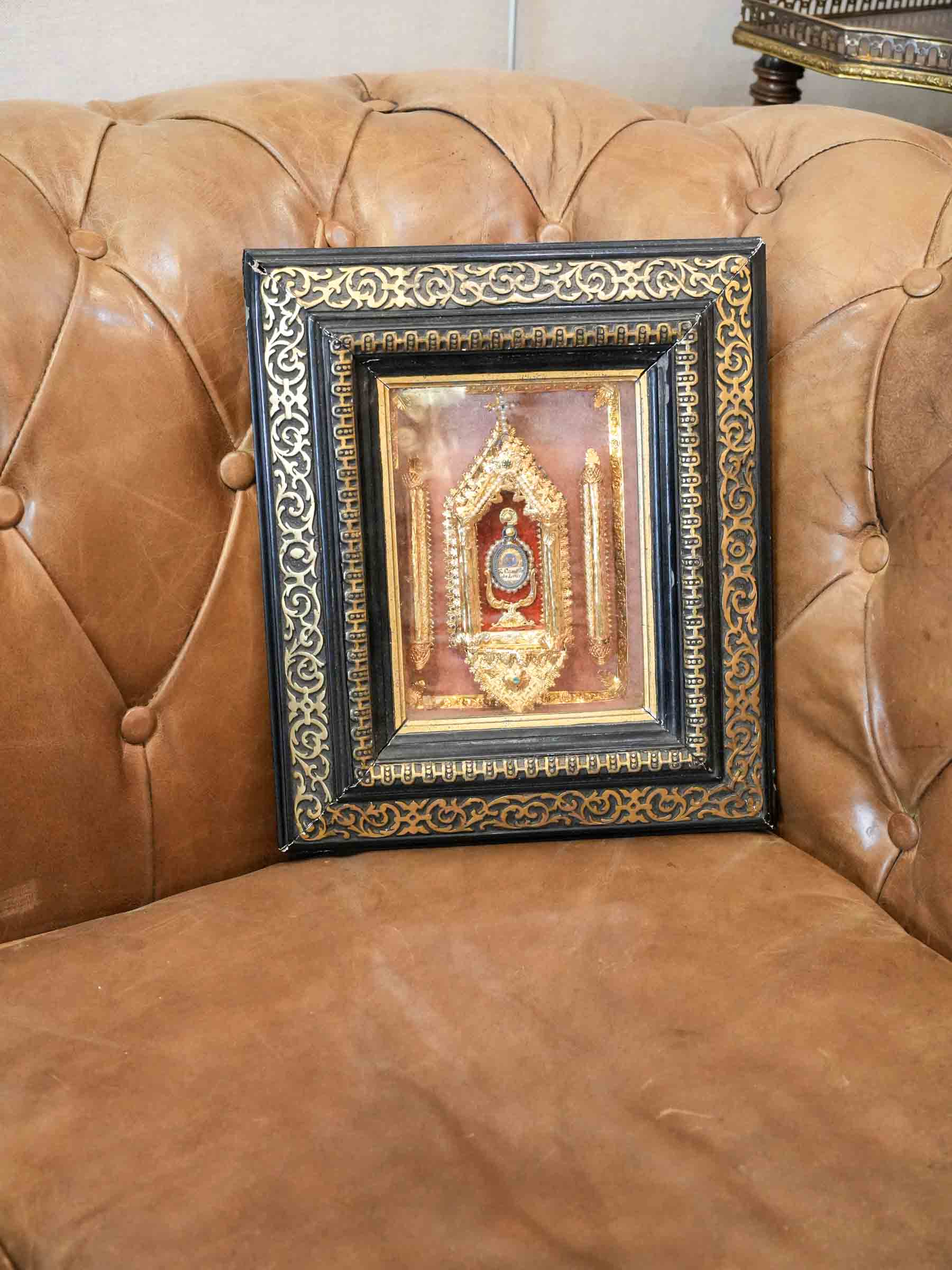 Timeless gilt brass ornament  