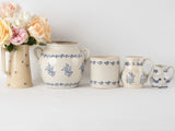 4 antique French blue & white Saint Uze pots & pitchers