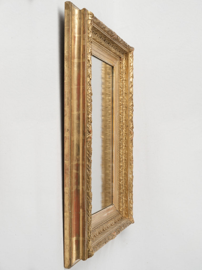 Antique Louis XVI style gilded mirror