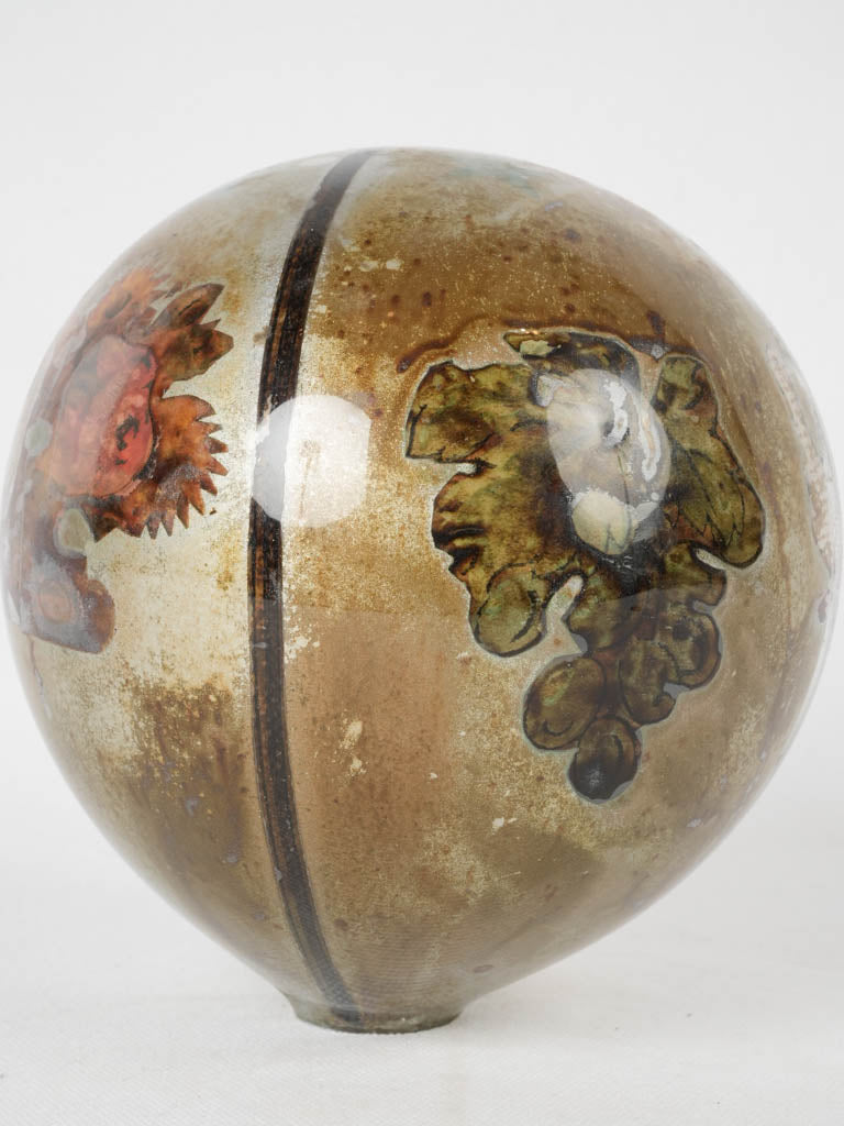 Intricately decorated blown glass sphere