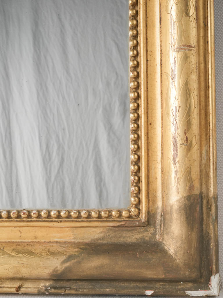 Elegant 19th-century bright gold leaf mirror
