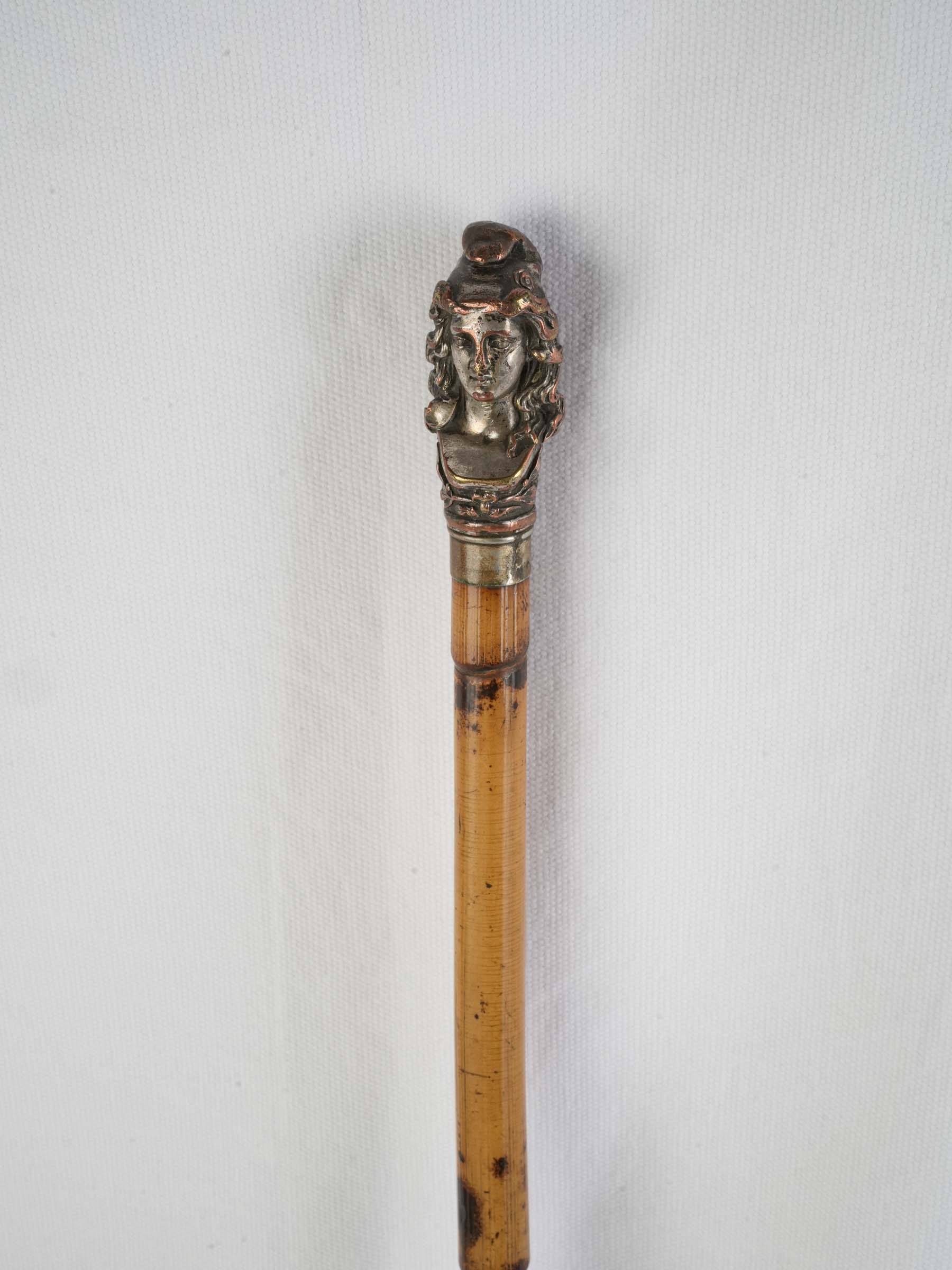 Elegant silvered handle collectibles cane.