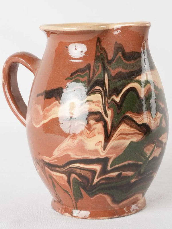 Antique French brown jaspée pitcher