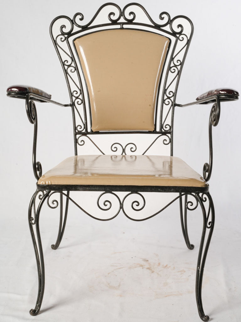 Elegant scrollwork wrought iron chair
