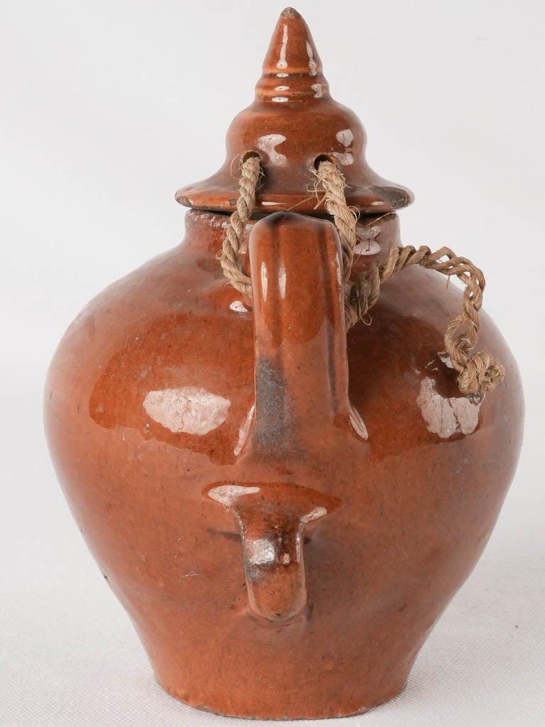 Small lidded pitcher w/ brown glaze & 3 handles 8"