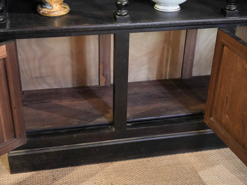 Hidden storage capability bookcase  