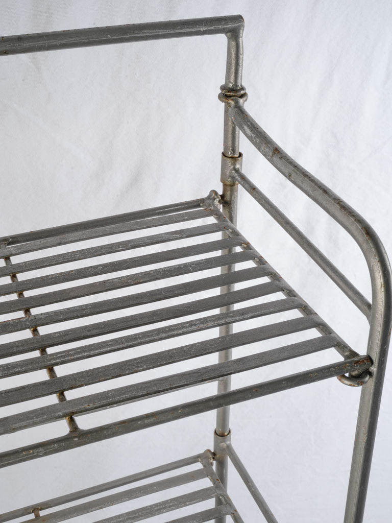 Graceful steel-framed utility shelves  