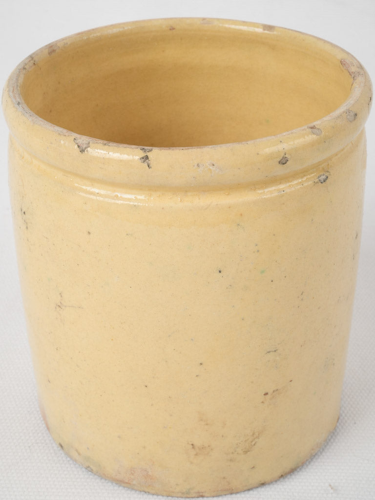 Charming yellow collectible pottery jam jar