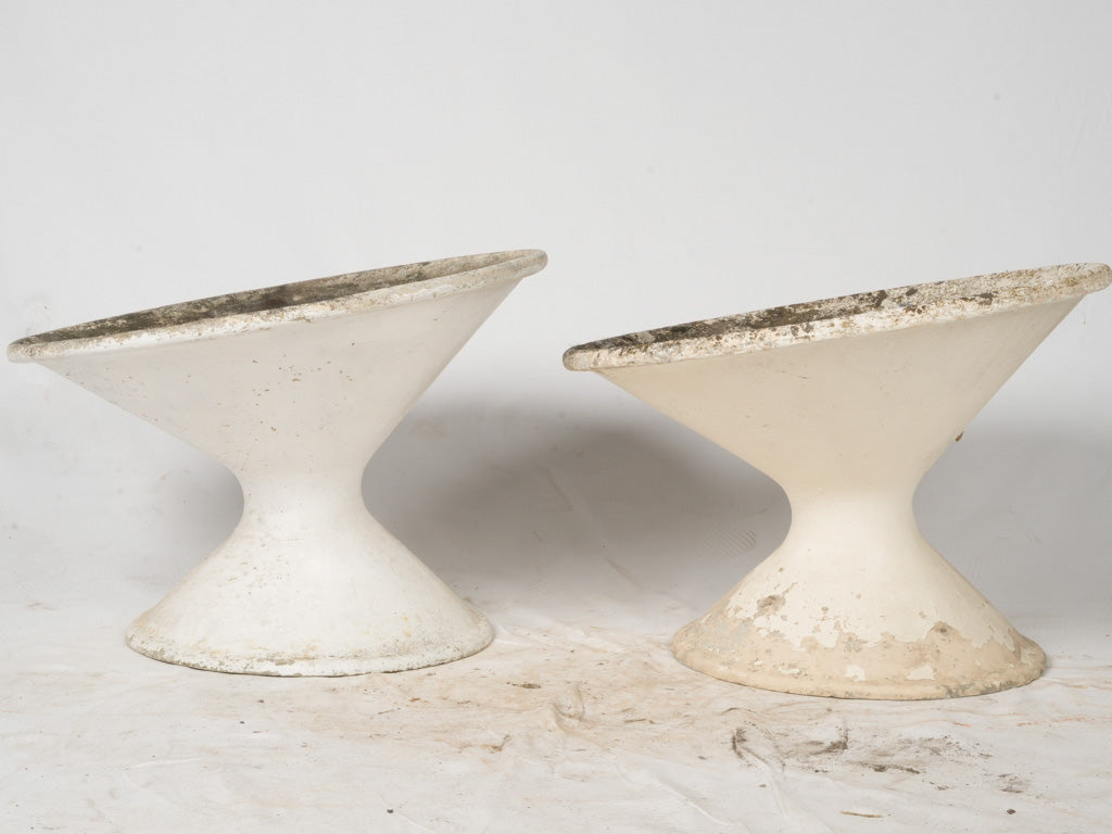 Patina-covered, rustic large Willy Guhl planters