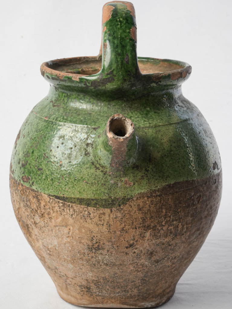 Mottled green glazed water jug  