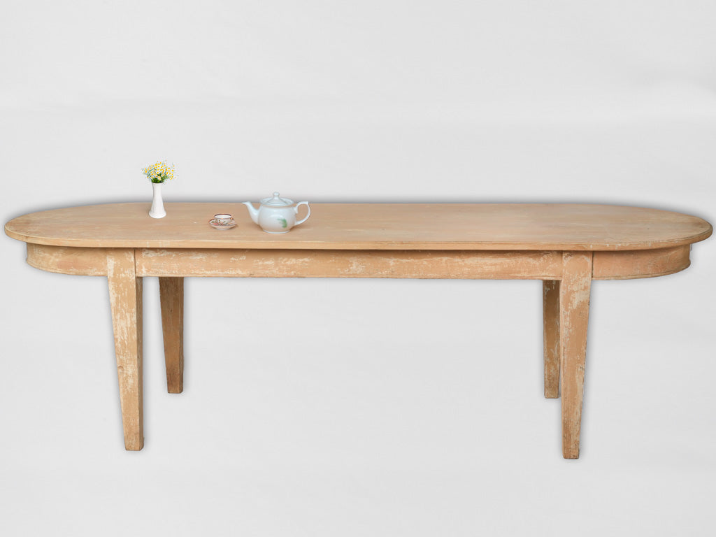 Aged ocher and beige oval table