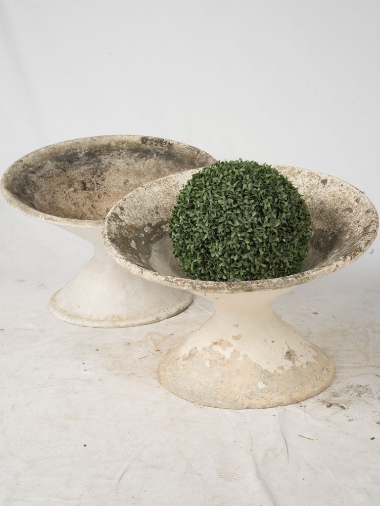 Aged, angled mid-century modern garden planters