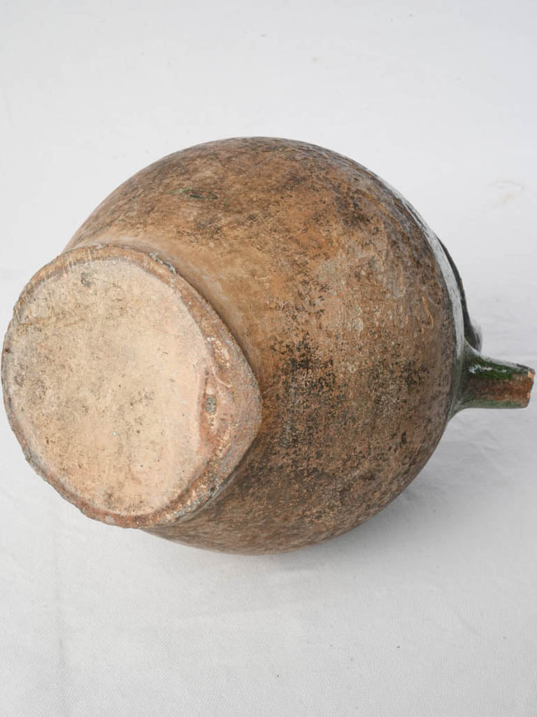 Beautifully distress-colored antique jug  