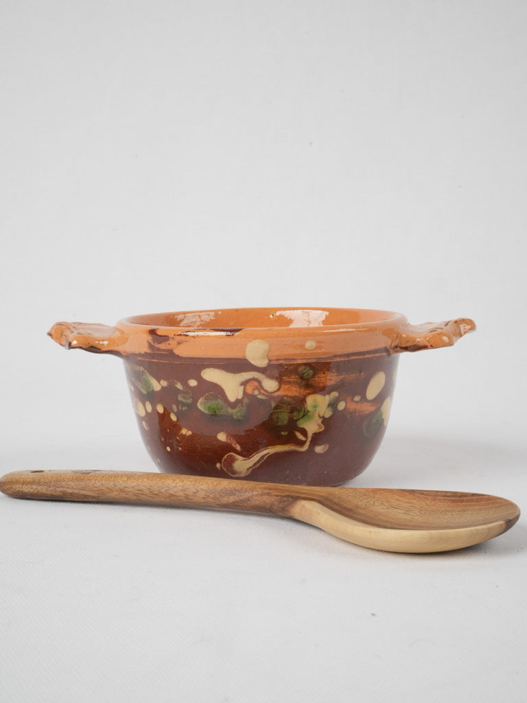 Charming ocher-ear-handled pottery bouillon dish