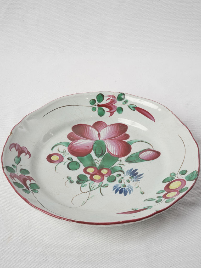 Authentic chipped-rim faience plate  