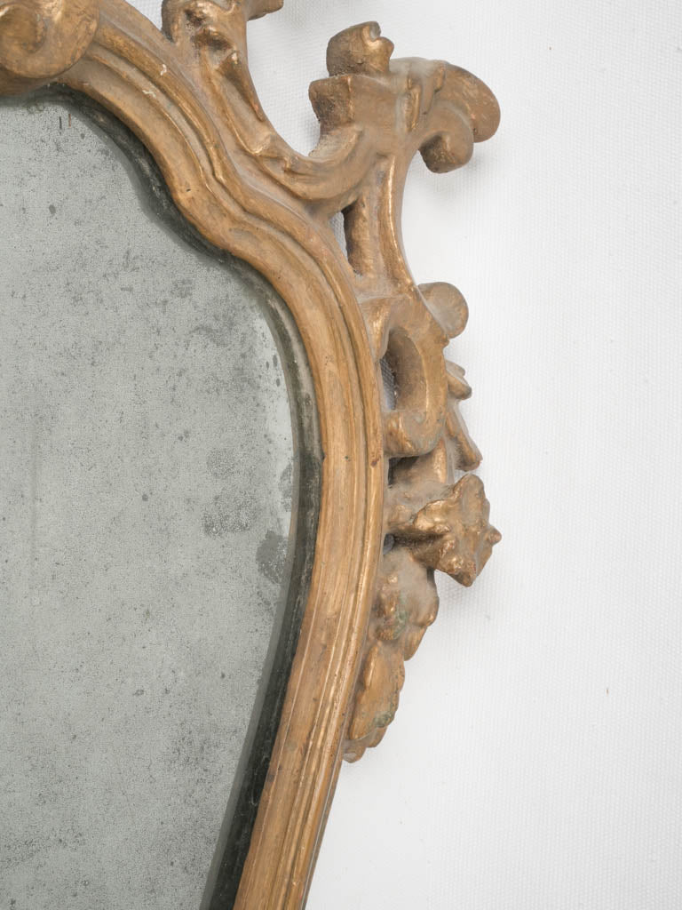 Romantic aged foxed mirror sconces