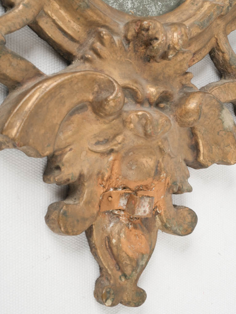 Artistically crafted gilded mirror sconces