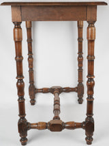 Intricately carved antique bedside table 