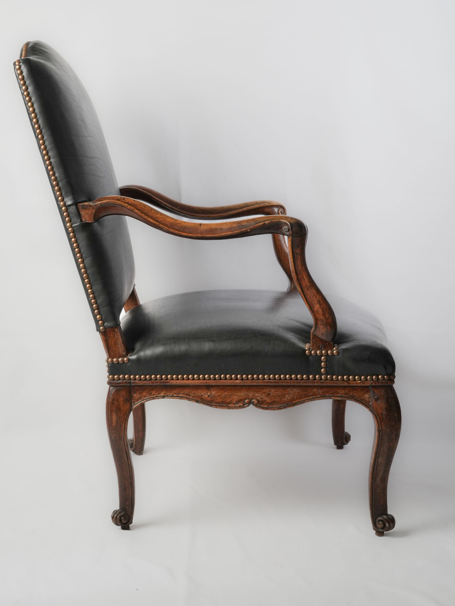 Refined carved walnut chair