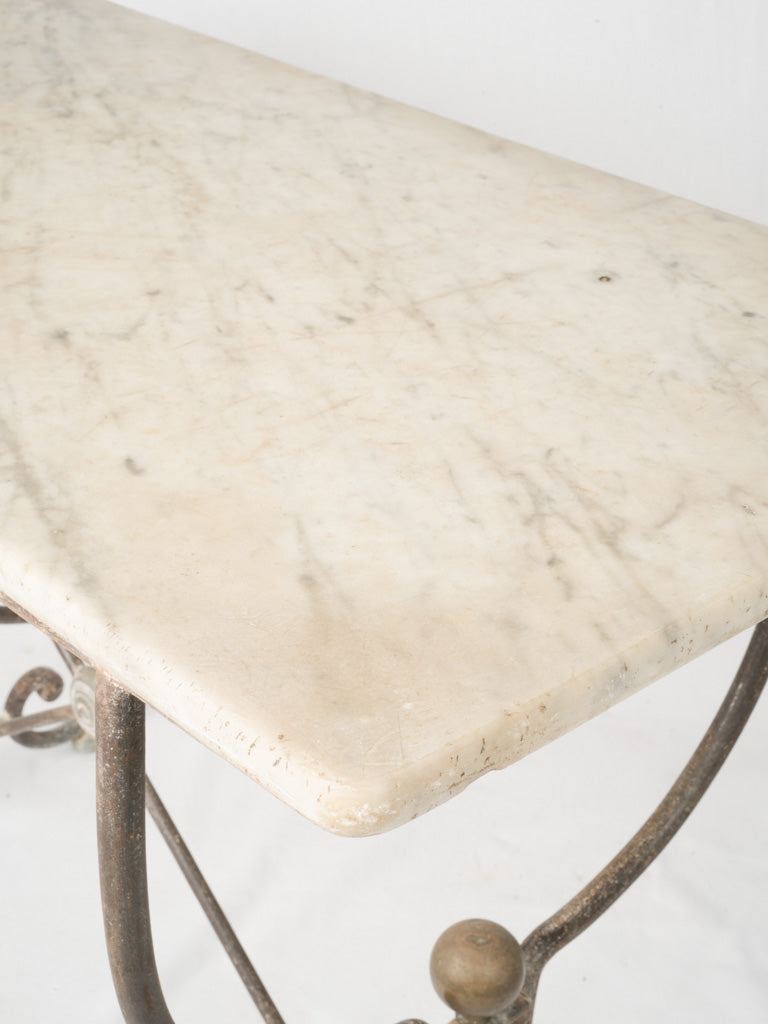 Classic scrolling iron base table  