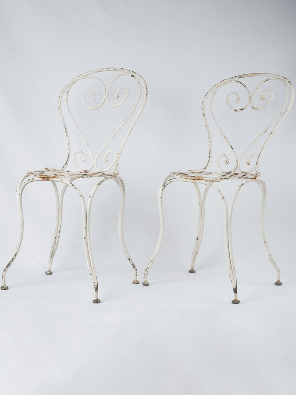 Antique French wrought iron garden chairs