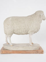 Repaired aged interior sheep figure