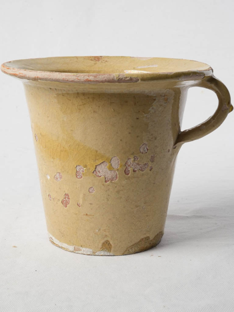 Aged yellow ceramic night vase  