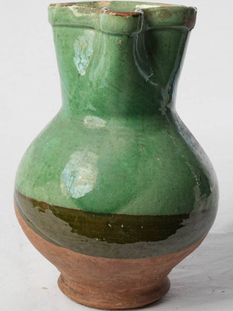Vintage green-glazed ceramic jug
